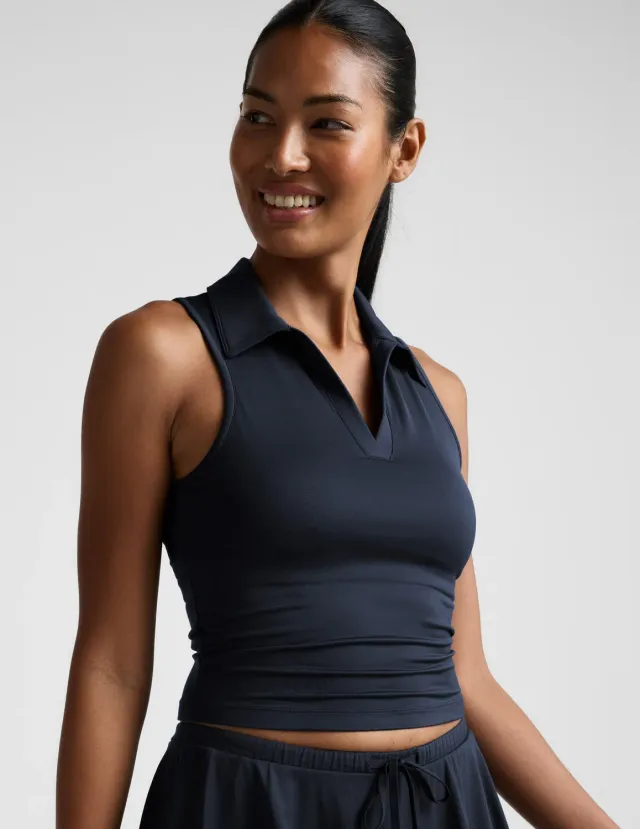 Beyond Yoga Sport Active Polo Tank linne Nocturnal Navy inbyggd BH