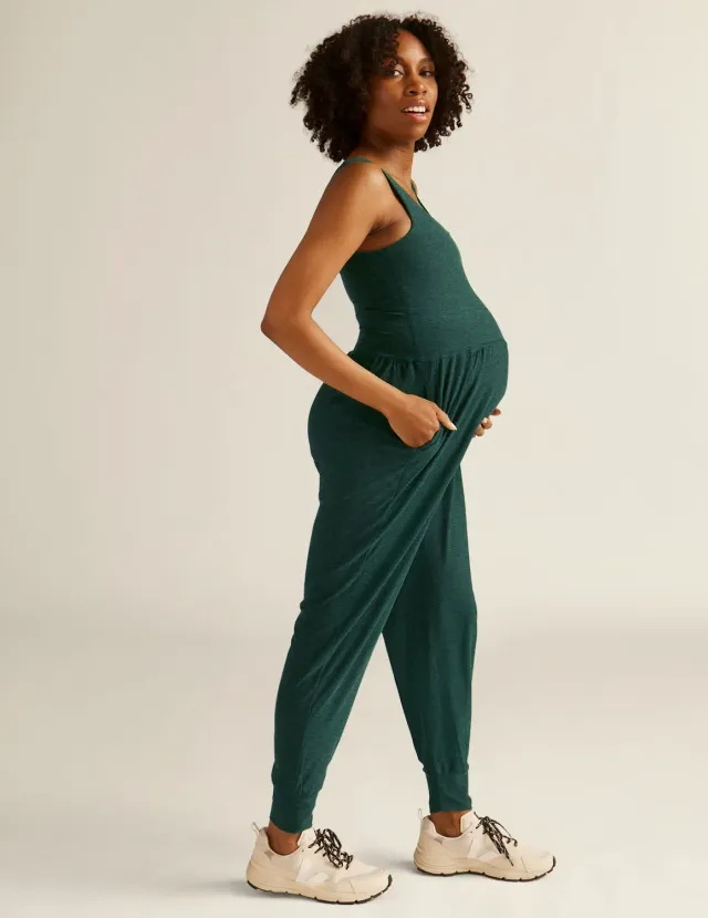 Beyond Yoga Spacedye Grow In Comfort gravidjumpsuit grön fickor